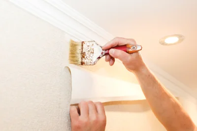 Pose de papier peint à la Madeleine — revêtements muraux et toiles de verre